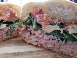 Chuck’s Roast Pork Sandwiches with Provolone, Sweet Peppers and Arugula